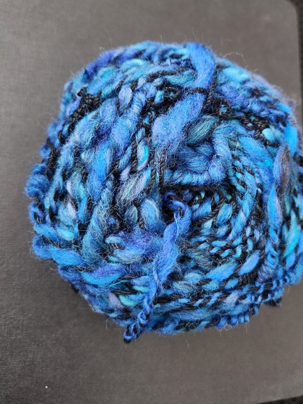 Handmade art yarn, new. 1.4 OZ, blue 2 PLY.